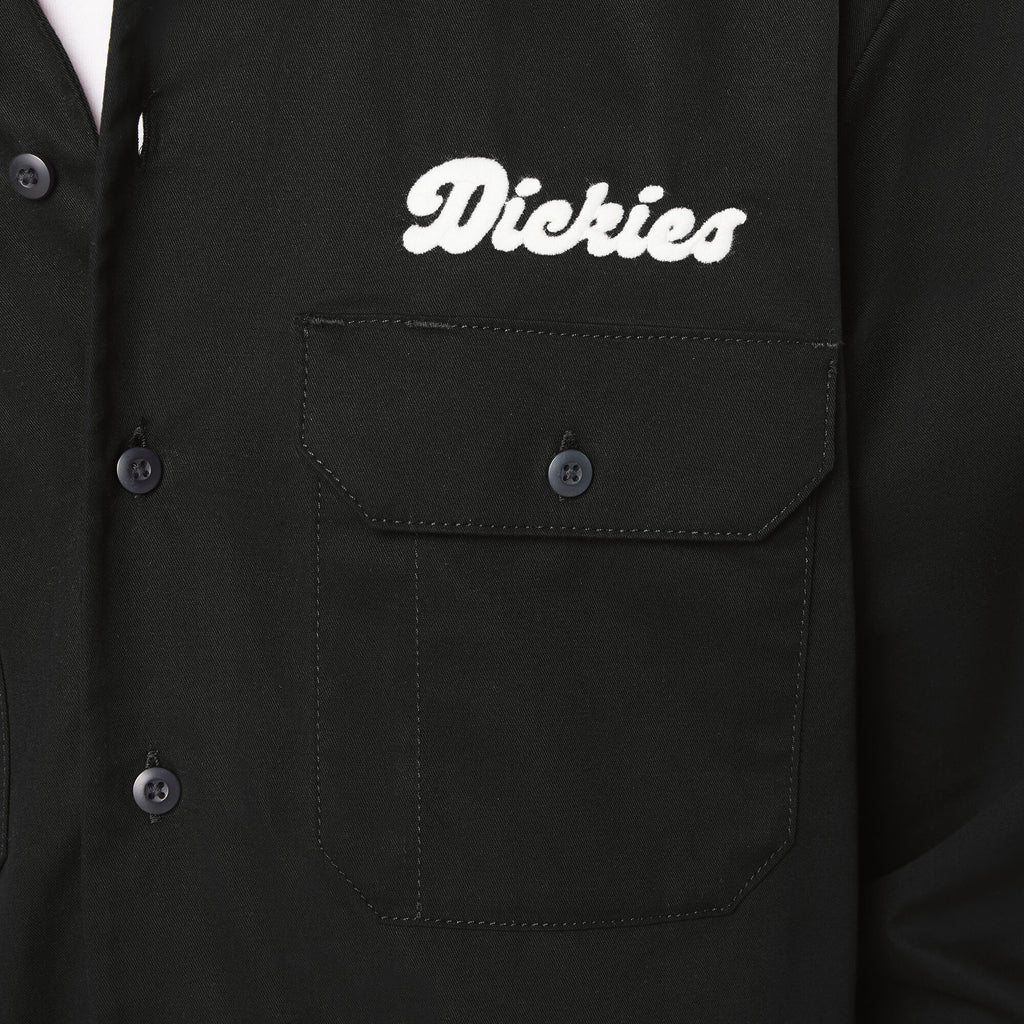 Black shirt with 'Dickies' logo on a pocket