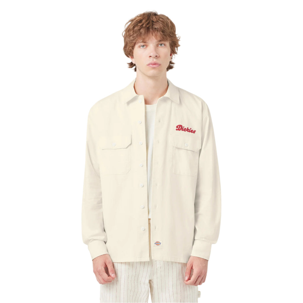 Person wearing a cream-colored denim jacket with a brand logo on a white background