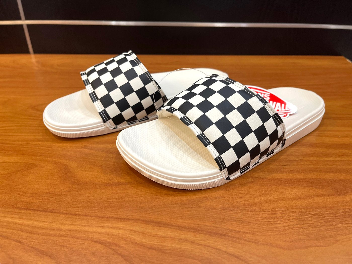 Vans Women s White Checkerboard Pattern Slides