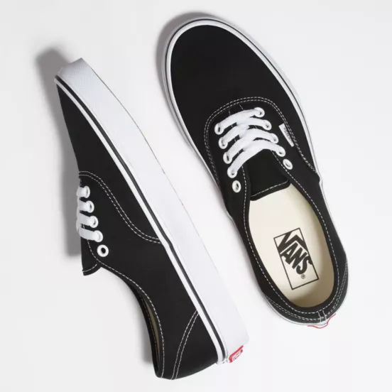 Vans Classic Slip-On stackform sneakers in black/white | ASOS